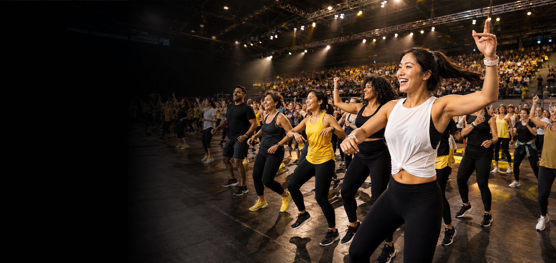 Woman dancing with the crowd at the Get A Move On community wellness event